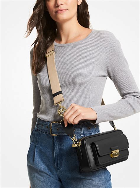 michael kors small leather camera bag stitching|michael kors bradshaw camera bag.